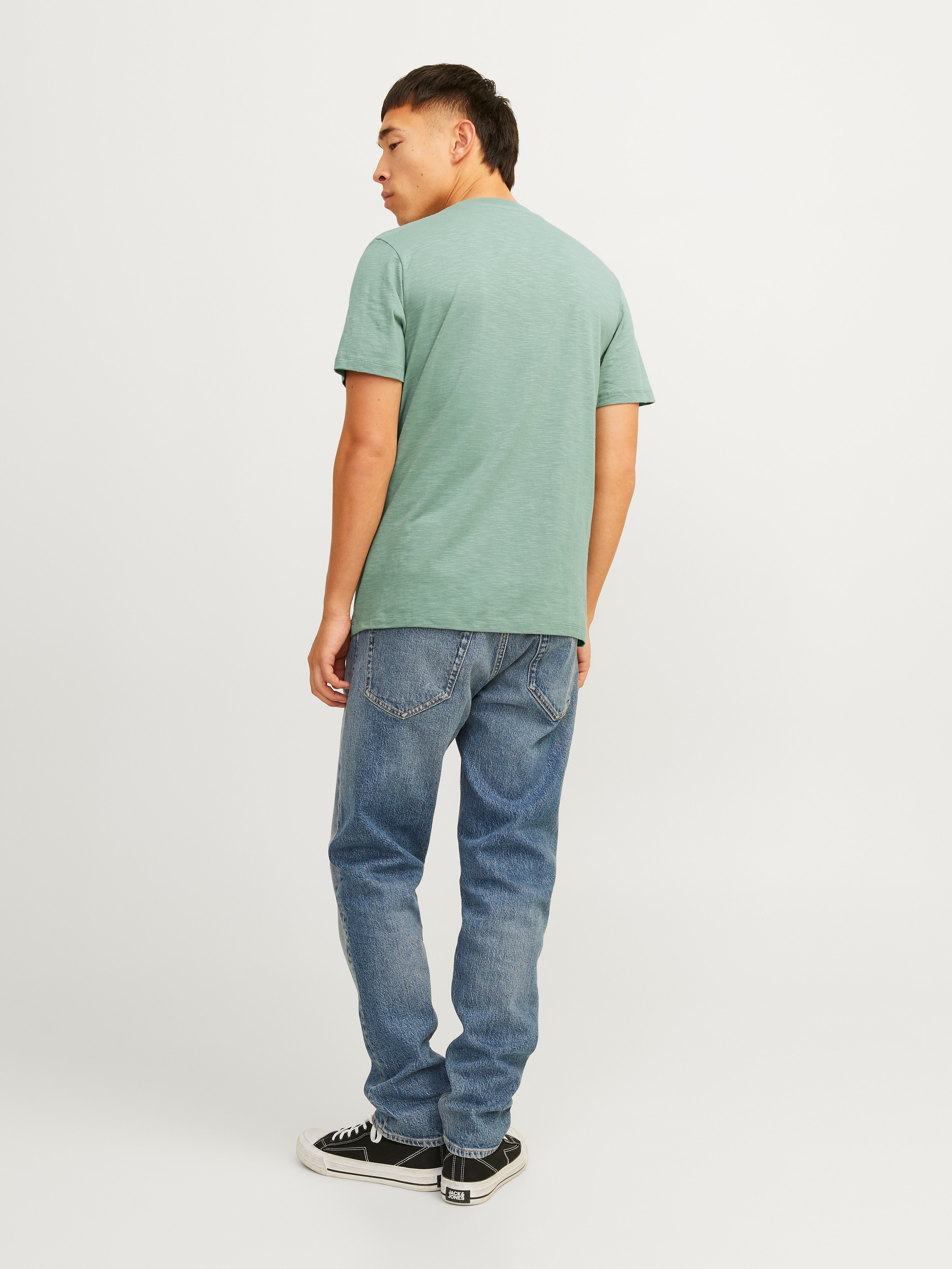 Green t shirt and jeans online